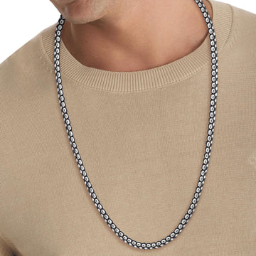 Ανδρική αλυσίδα Calvin Klein 35100038 ατσάλινη σε ασημί χρώμα με μήκος 60cm, φορεμένη.